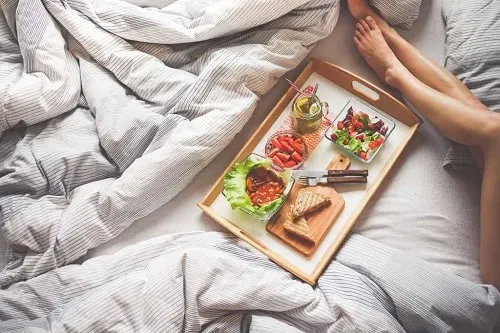 mom having breakfast in bed