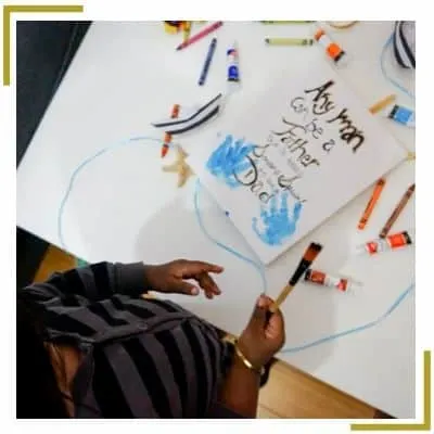 toddler making Father's Day craft