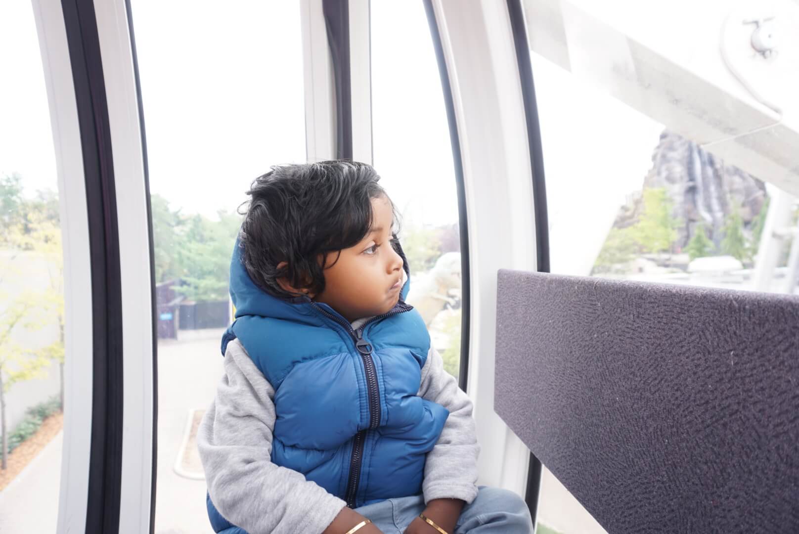 Toddler riding the Niagra Falls Sky Wheel.