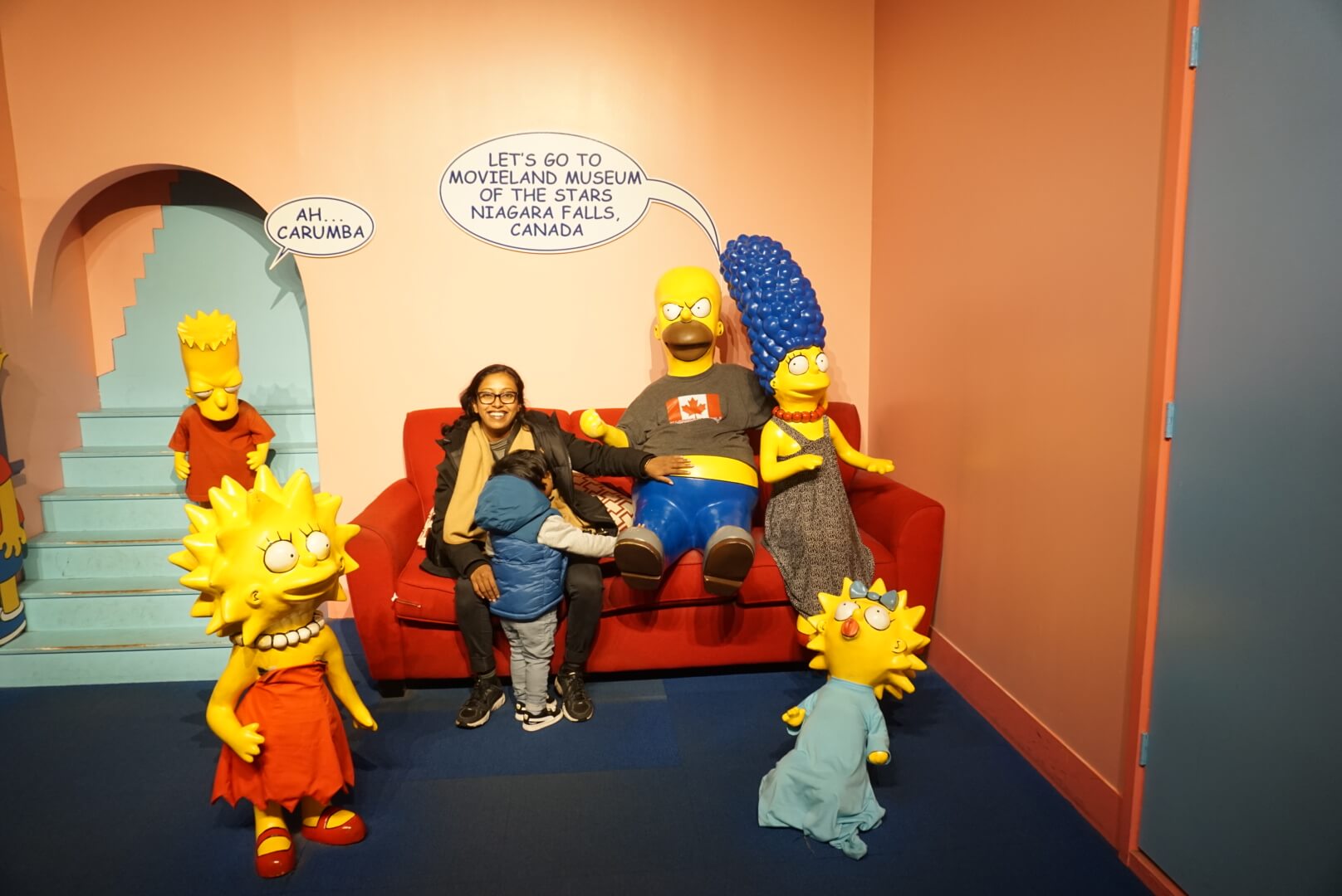 Family visiting movieland wax museum Niagara Falls.