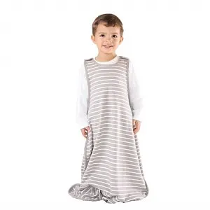 toddler boy wearing woolino toddler sleep sack