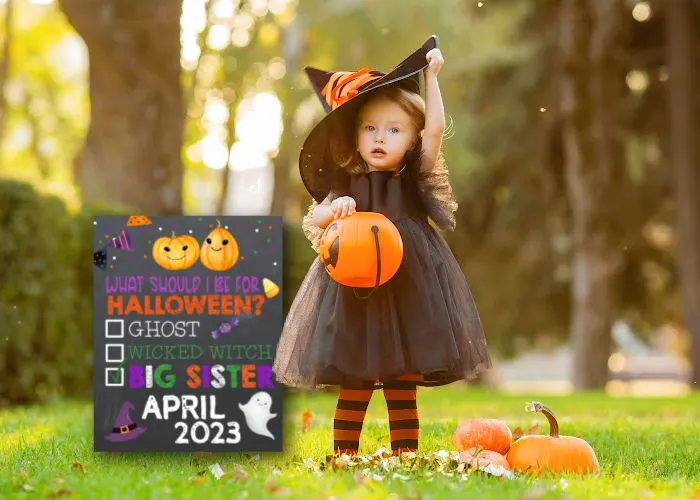 cute little girl dressed like witch standing next to Halloween sibling pregnancy announcement sign
