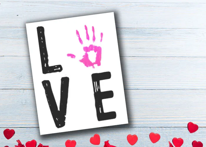 easy Valentine's day handprint craft for toddlers. Page spelling LOVE with handprint for O