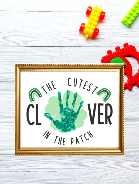 cute St. Patrick's Day handprint craft with clovers for preschool