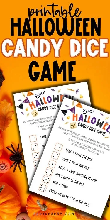 flat lay of Halloween Pass The Candy Dice Game on orange background