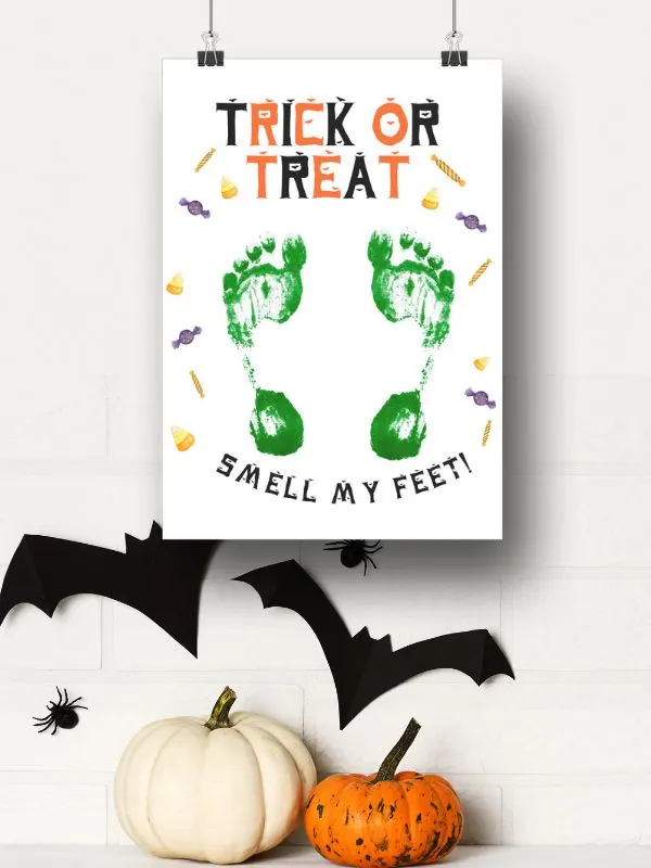 Halloween footprint craft idea that says trick or treat smell my feet. 