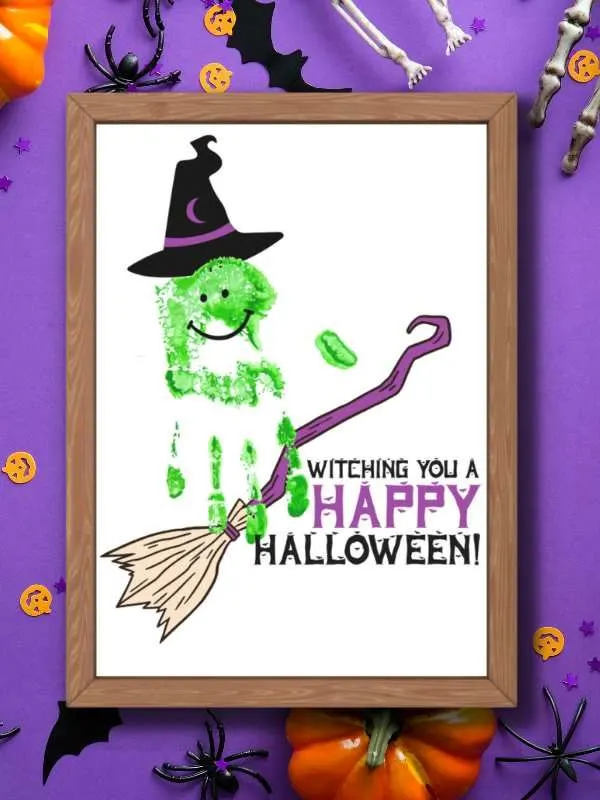 Halloween witch handprint art for toddlers to make. text says witching you a happy halloween