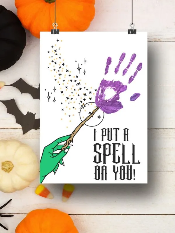 magical wand handprint Halloween craft for preschoolers