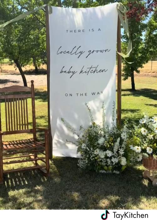 shows a linen simple homegrown baby shower backdrop