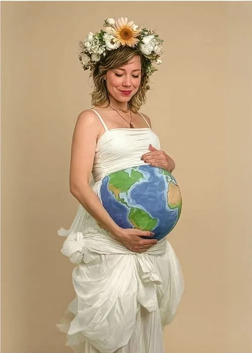 pregnant woman dressed like mother earth for halloween