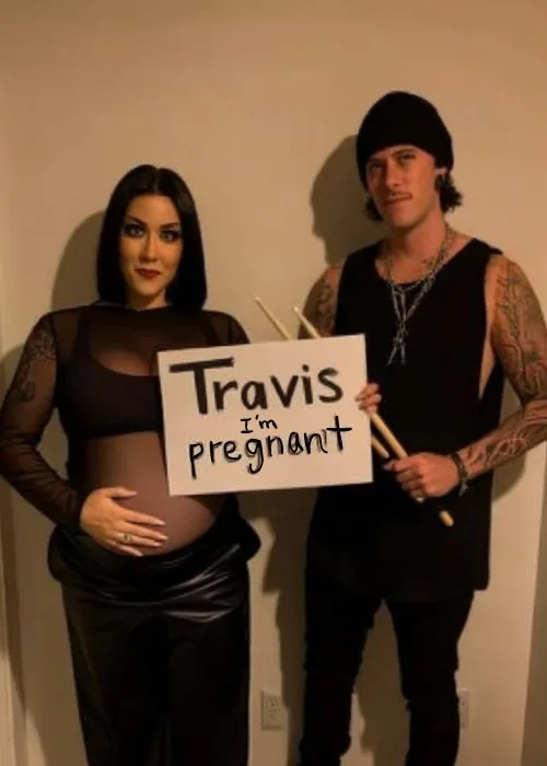pregnant couple costume idea. dress as kourtney kardashian and travis barker and hold the sign "travis im pregnant"