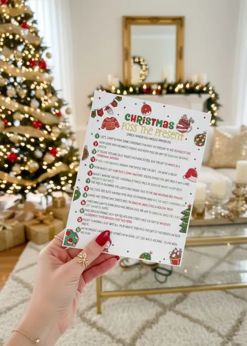 a woman's hand is holding the printable party game