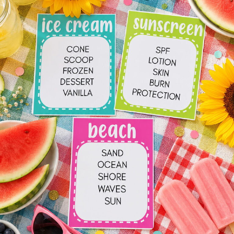 flat lay of summer taboo game cards on picnic blanket